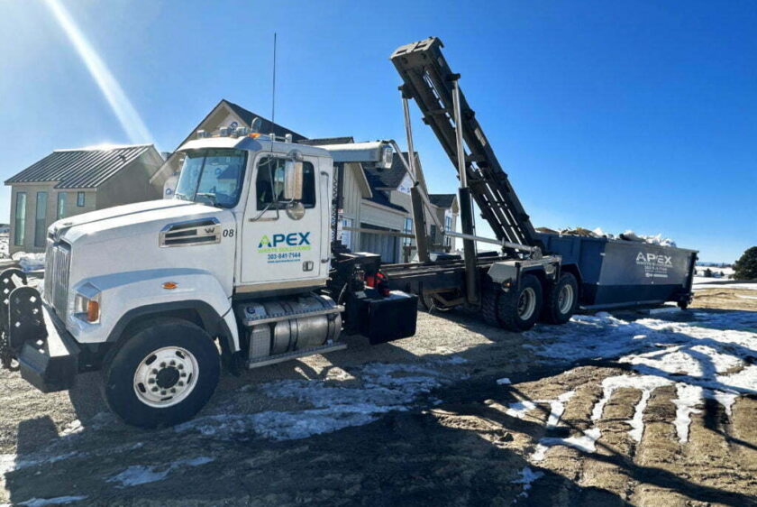 roll-off dumpster truck unloading